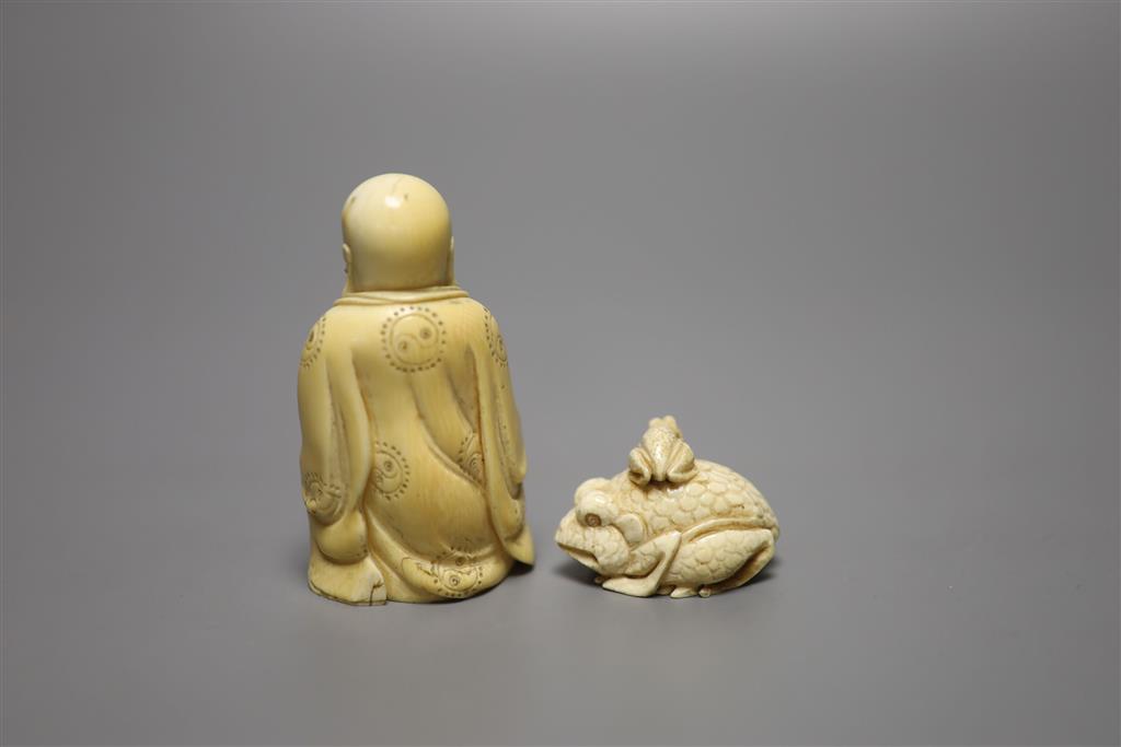 A Meiji period Japanese carved ivory netsuke, and an ivory figure